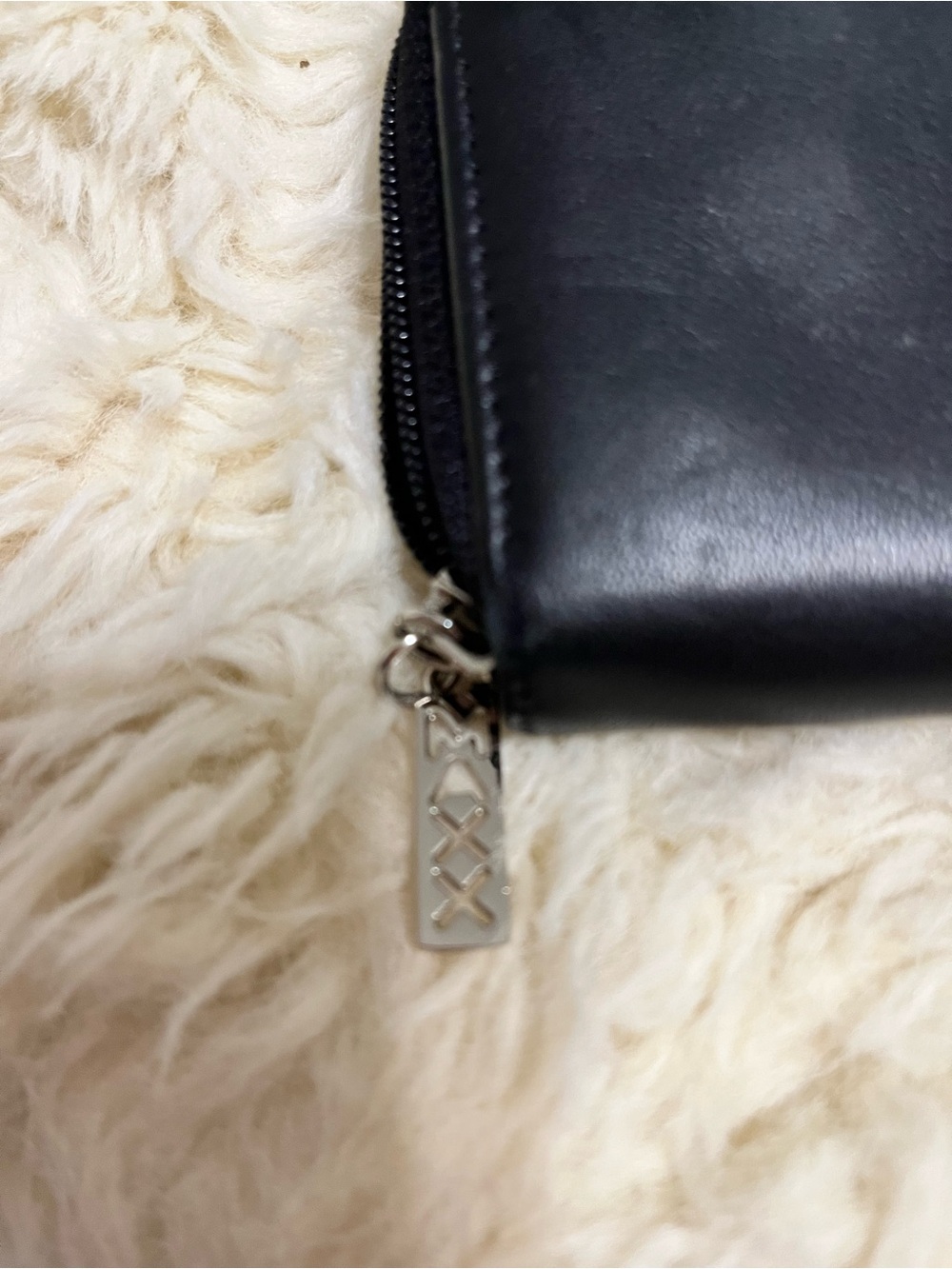 Black Leather Zip Wallet with Silver Accent